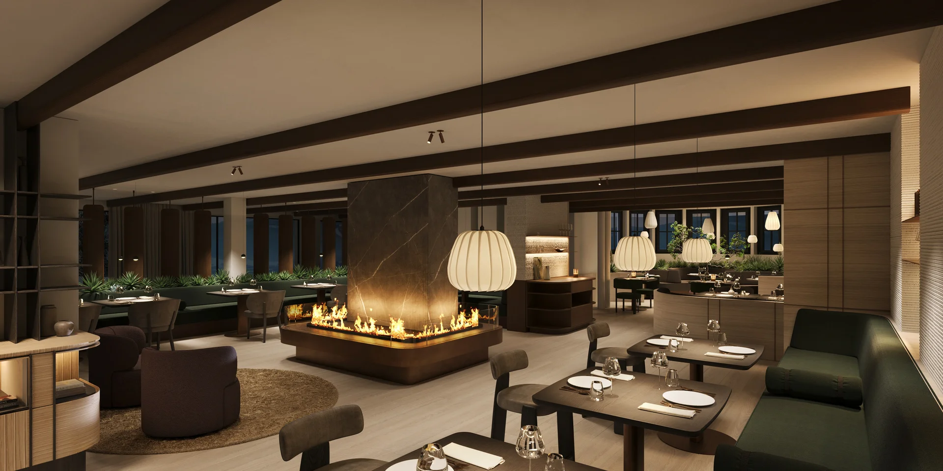 Modern restaurant with central fireplace and neatly set tables
