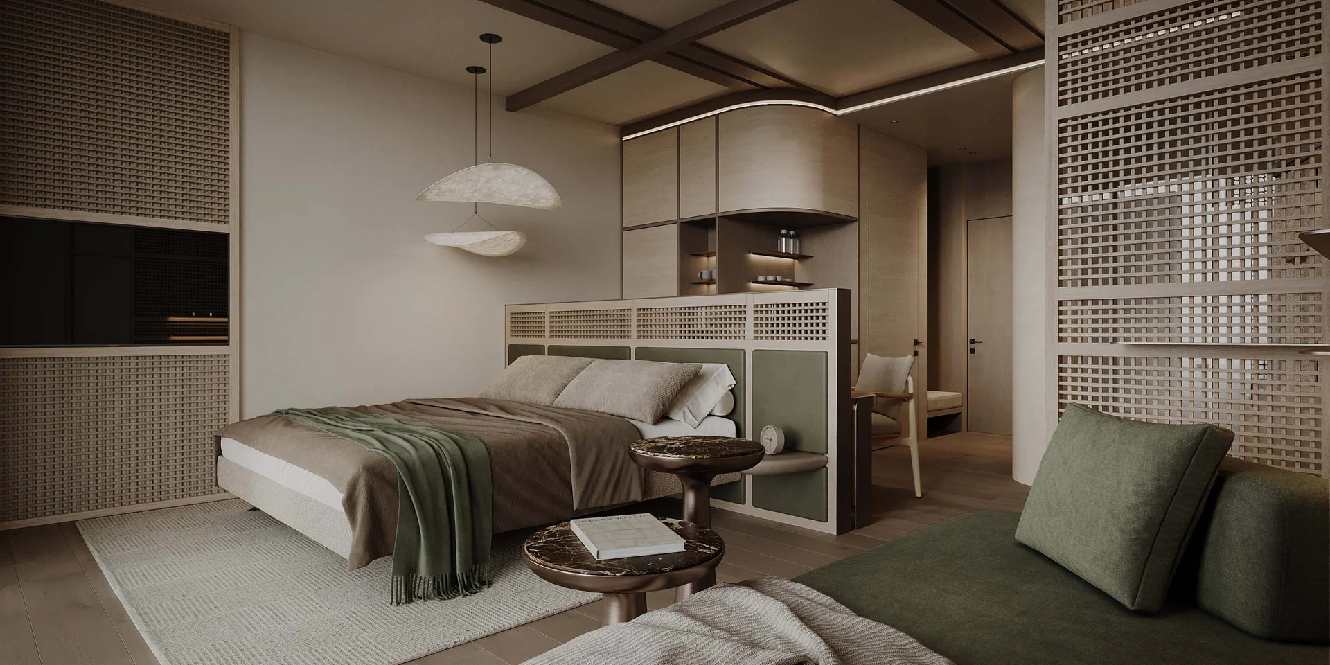 Modern bedroom with green sofa and accent table in warm earth tones