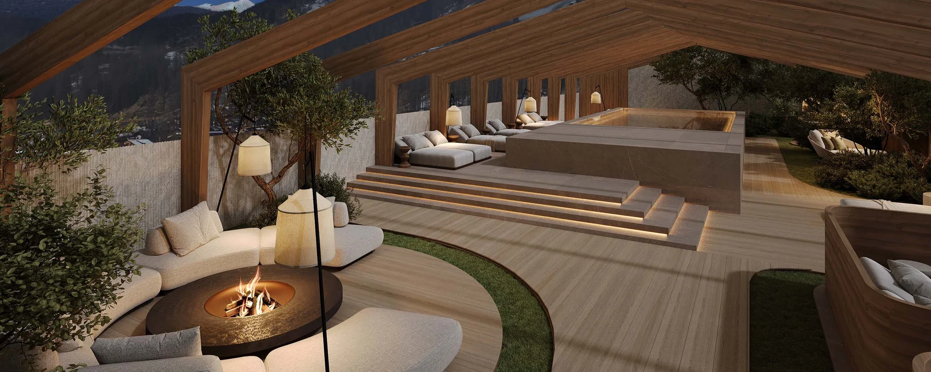 Hotel Monika in den Dolomiten – mit Pools und Spa Area Moderner Außenbereich mit Feuerstelle, Liegen und Holzstruktur bei Nacht